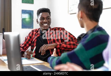 Young multiracial people studying together - School education concept Stock Photo