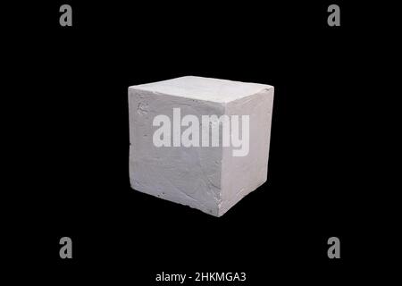 white plaster square in isolation on a black background. High quality photo Stock Photo