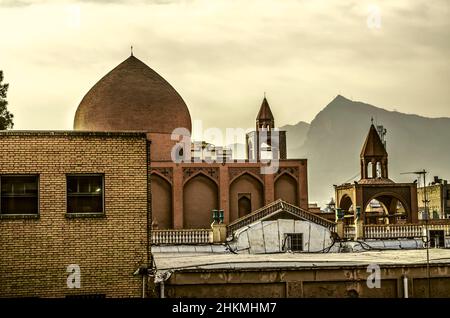 View of the dome and bell towers with crosses of the monastery cathedral of Christ the Savior, located in the Armenian quarter Nor Julfa in the city o Stock Photo