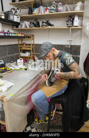 MAISON SNEAKERS, CLEANING THE SNEAKERS Stock Photo - Alamy