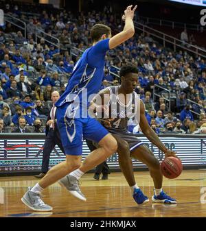 Creighton center Ryan Kalkbrenner (11) fights for a rebound with North ...