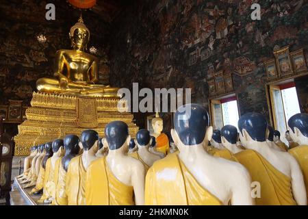 Ubosot or Ordination Hall with 80 disciples of Lord Buddha, Wat Suthat, Bangkok, Thailand