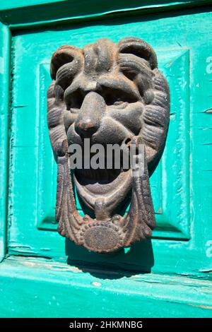 ornate lions head door knocker Teguise Lanzarote Canary Islands Spain Stock Photo