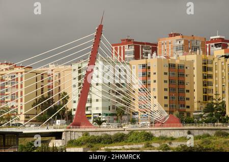 Cable-stayed bridge over a ravine and buildings. La Feria del Atlantico. Las Palmas de Gran Canaria. Gran Canaria. Canary Islands. Spain. Stock Photo