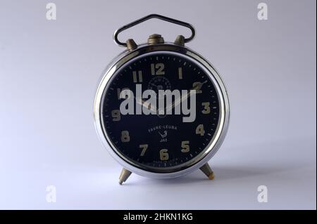 Mumbai Maharashtra India Asia Oct. 08 2021 Vintage Favre Leuba Alarm clock on grey background made in india. Stock Photo