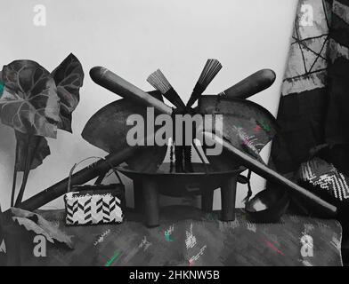 Art inspired by Fijian Curios, Burton Brothers studio, photography studio, circa 1884, Dunedin, black-and-white photography, Studio set up of a kava bowl, kava cup and weaved basket on top of a weaved mat, above two fans, two hair combs, necklaces and two clubs that cross over each, Classic works modernized by Artotop with a splash of modernity. Shapes, color and value, eye-catching visual impact on art. Emotions through freedom of artworks in a contemporary way. A timeless message pursuing a wildly creative new direction. Artists turning to the digital medium and creating the Artotop NFT Stock Photo