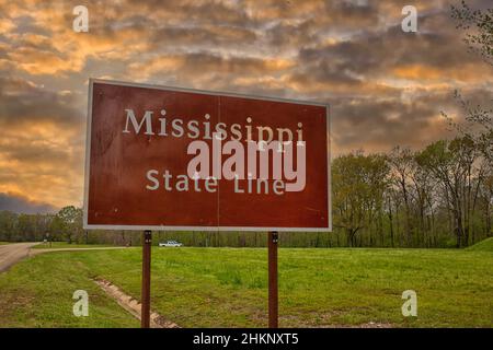 Sign of the Mississippi state line near the stateline of Alabama, USA Stock Photo