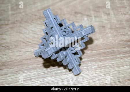 Gray abstract models printed on 3d printer from powder close-up. Stock Photo