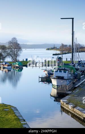 Boat moored in marina at Bowling in Dunbartonshire Stock Photo