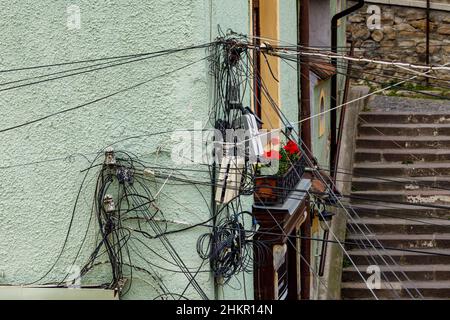 chaos electrical power cable in romania Stock Photo