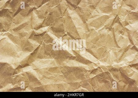 Texture of coarse crumpled brown paper, used for food packaging. background Stock Photo