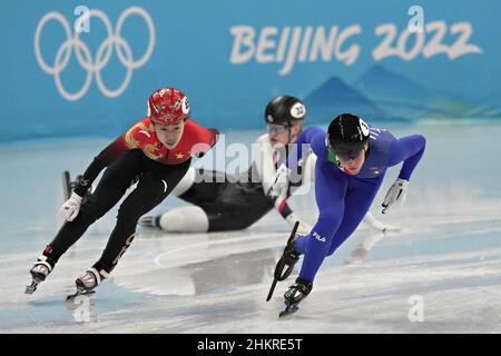 Beijing, China. 05th Feb, 2022. Corinne Stoddard, of the USA crashes into the wall as Arianna Fontana, #3 of Italy, and Yuting Zhang, #45 of China, pull ahead during the Women's 500m Short Track Speed Skating heats at the Beijing Winter Olympic in Beijing on Saturday, February 5, 2022. Stoddard failed to move into the quarter finals. Photo by Richard Ellis/UPI Credit: UPI/Alamy Live News Stock Photo