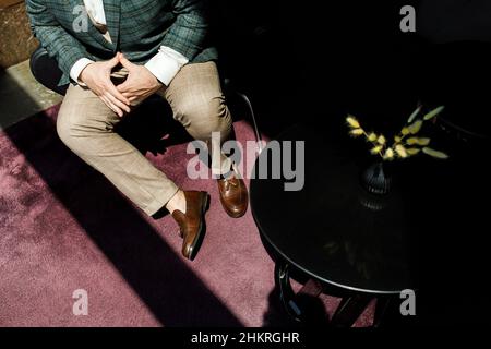 A man is waiting in the hotel lobby Stock Photo
