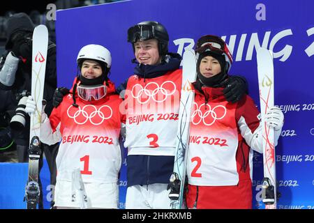 (L-R) Mikael Kingsbury (CAN), Walter Wallberg (SWE), Ikuma Horishima ...