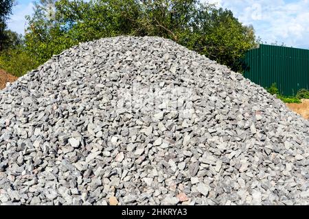 A pile of rubble on a construction site, gray stones. Stock Photo