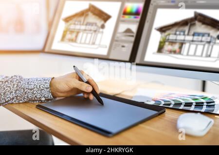 African Graphic Web Designer Using Design Editing Software Stock Photo