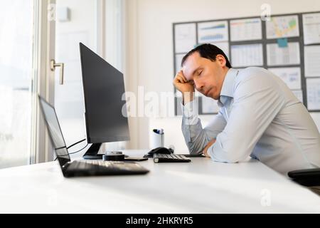 Bored Boss Man Sleeping. Restful Tired Employee Stock Photo - Alamy