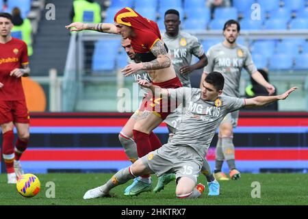 Johan Vasquez of Genoa CFC and Nicolò Zaniolo of AS Roma during football  Serie A Match at Stadio Olimpico, As Roma v Genoa on February 5, 2022 in  Rome, Italy. (Photo by