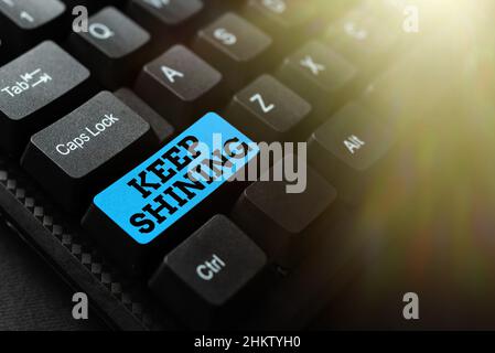 Conceptual caption Keep Shining. Internet Concept being a good demonstrating excelling on a chosen endeavor or career Abstract Office Typing Jobs Stock Photo