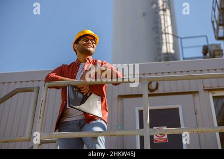 Young construction specialist working on modern plant Stock Photo