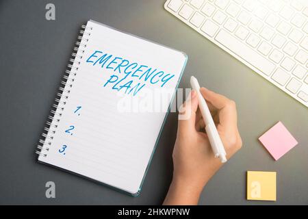 Conceptual caption Emergency Plan. Business approach Procedures for response to major emergencies Be prepared Keyboard Over A Table Beside A Notebook Stock Photo
