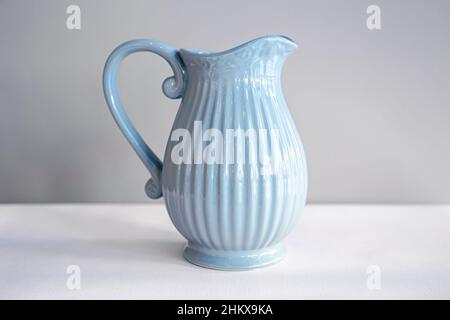 https://l450v.alamy.com/450v/2hkx9ka/beautiful-textured-blue-jug-for-drinks-close-up-2hkx9ka.jpg