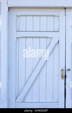 Closed white old wooden door Stock Photo