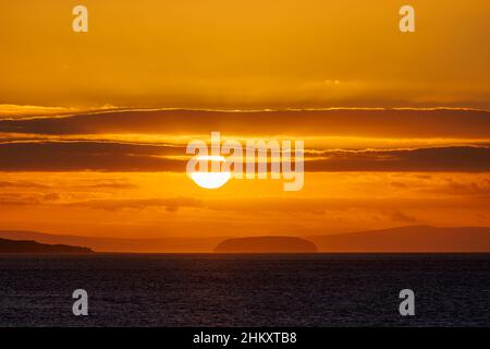 Golden glow along the horizon Stock Photo - Alamy