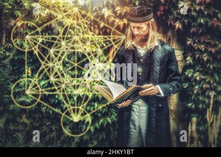Alchemist in a beautiful ornamental dress in nature. Stock Photo