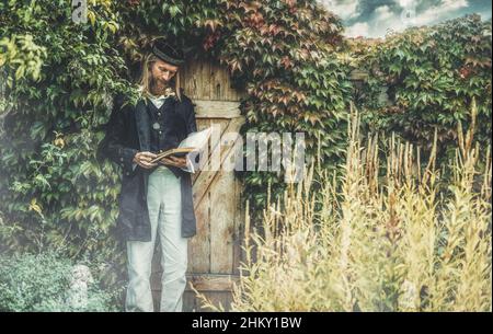 Alchemist in a beautiful ornamental dress in nature. Stock Photo