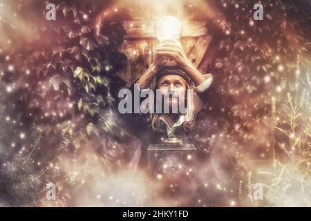 Alchemist in a beautiful ornamental dress in nature. Stock Photo