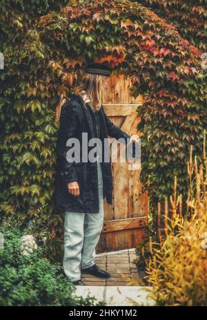 Alchemist in a beautiful ornamental dress in nature. Stock Photo