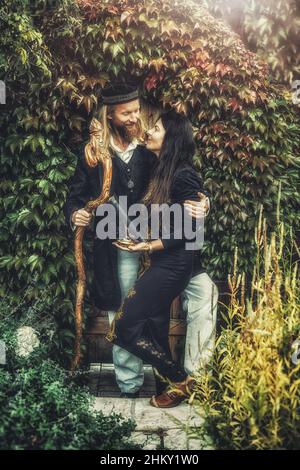 Alchemist in a beautiful ornamental dress in nature. Stock Photo