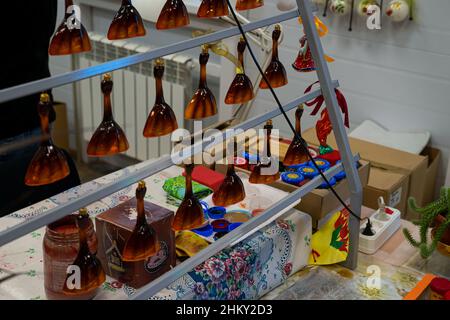 Nizhny Novgorod, Russia. January 03, 2022. Christmas Tree Toys. Glass balalaikas in Russian style. The Factory of Christmas Tree Ornaments Stock Photo