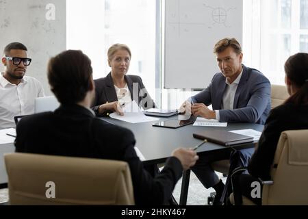 Diverse business team of different ages partners, coworkers, leaders Stock Photo