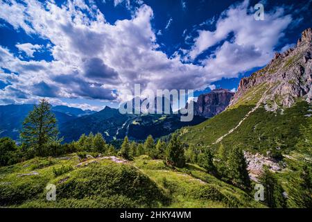 Summits of Plattkofel, Grohmannspitze and Langkofel in the middle, rock faces of Sella group on the right side, seen from Pordoi Pass. Stock Photo