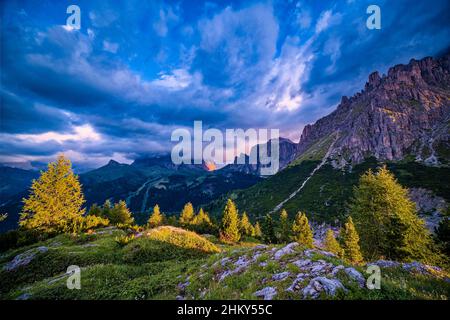 Plattkofel, Grohmannspitze and Langkofel in clouds in the middle, rock faces of Sella group on the right side, seen from Pordoi Pass. Stock Photo