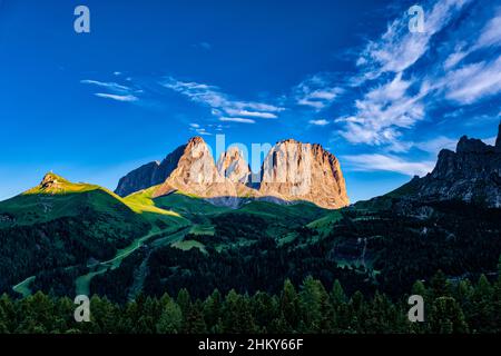 Summits of Plattkofel, Grohmannspitze and Langkofel in the middle, rock faces of Sella group on the right side, seen from Pordoi Pass. Stock Photo