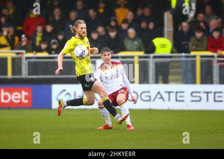 EnviroVent Stadium, Harrogate, England - 5th February 2022 Matty Foulds (14) of Bradford clears the ball with Luke Armstrong (29) of Harrogate closing in - during the game Harrogate v Bradford City, EFL League 2, 2021/22, at The EnviroVent Stadium, Harrogate, England - 5th February 2022 Credit: Arthur Haigh/WhiteRosePhotos/Alamy Live News Stock Photo