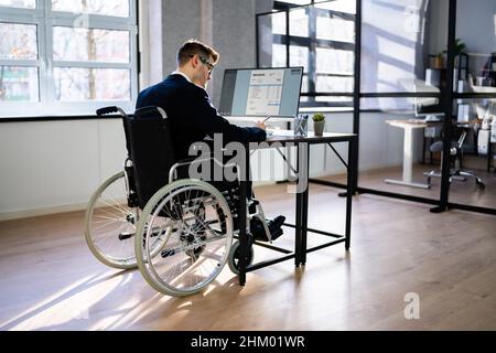 Accountant Using Tax Software In Office. Invoice Bill On Computer Stock Photo