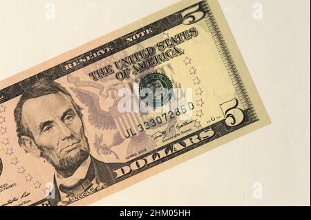 Mumbai India Asia April 22 2021 American five dollar portrait of Abraham Lincoln was an American statesman and lawyer Stock Photo