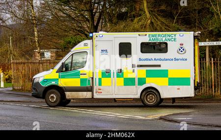 An NHS Scottish Ambulance Service emergency ambulance responding to a 999 call from their depot at West School Road in Dundee, Scotland Stock Photo