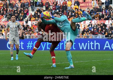 Salvatore Sirigu of Genoa CFC and Tammy Abraham of A.S. Roma during the  24th day of the Serie A Championship between A.S. Roma vs Genoa CFC on 5th  February 2022 at the