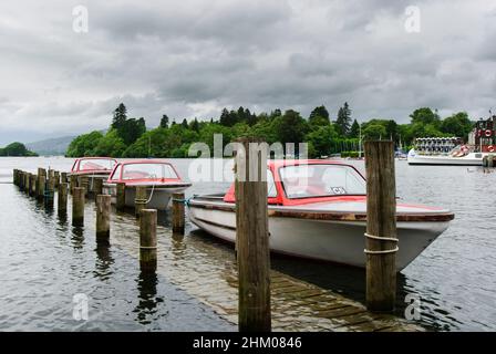 Windermere is a large lake in Cumbria’s Lake District National Park, northwest England. It’s surrounded by mountain peaks and villages, including Bown Stock Photo