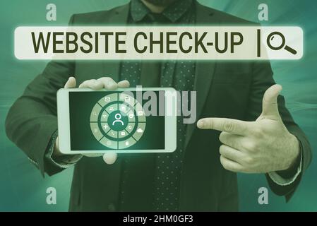 Conceptual display Website Check Up. Business idea Website Check Up Man holding Screen Of Mobile Phone Showing The Futuristic Technology. Stock Photo