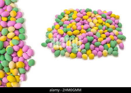 Group of colorful peanuts in glaze. Top view. Stock Photo