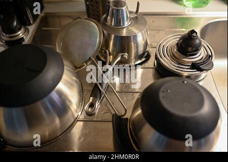 kitchen ware standing on sink drying afterwashing Stock Photo
