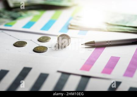 Polish currency on printed charts and analyzes Stock Photo