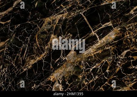 Gold and white Patterned natural of dark gray marble texture background for product design. Black marble natural pattern for background. Stock Photo