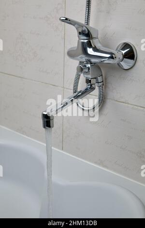 The plumbing switch on the shower faucet has been repaired Stock Photo